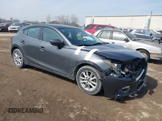 2014 Mazda 3 i Grand Touring with VIN JM1BM1M74E1212699, listed as a IAAI auction lot 41804428 with 195,472 mi miles and . Bid and sale history available at DreamBid. Image 1.
