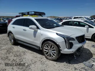 2023 Cadillac XT4 AWD Premium Luxury with VIN 1GYFZDR46PF130198, listed as a Copart auction lot 57763285 with 8,346 mi miles and Salvage title. Bid and sale history available at DreamBid. Image 4.