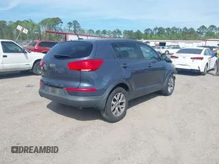 2015 Kia Sportage LX with VIN KNDPB3AC9F7757711, listed as a IAAI auction lot 41759749 with 179,111 mi miles and . Bid and sale history available at DreamBid. Image 4.