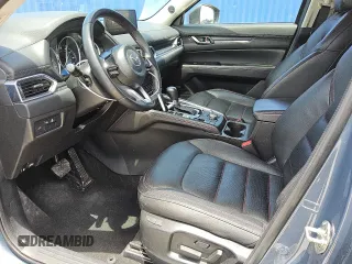2024 Mazda CX-5 S Carbon Edition z VIN JM3KFBCL3R0481732, wystawiony jako Copart lot #56997135 z przebiegiem 32 887 mil mil oraz Tytuł czysty. Historia ofert i sprzedaży dostępna na DreamBid. Obrazek 7.