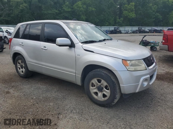 2006 Suzuki Grand Vitara z VIN JS3TE941764101657, wystawiony jako Copart lot #54943205 z przebiegiem 206 744 mil mil oraz Szkody całkowita. Historia ofert i sprzedaży dostępna na DreamBid. Obrazek 4.
