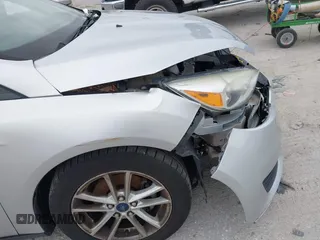 2015 Ford Focus SE with VIN 1FADP3K25FL328797, listed as a IAAI auction lot 41328404 with 72,368 mi miles. Bid and sale history available at carsss.com. Image 12.