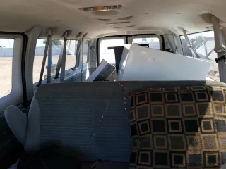 2004 Ford Econoline Passenger XL with VIN 1FBSS31LX4HB16895, listed as a Copart auction lot 65115554 with 48,980 mi miles and Salvage Title. Bid and sale history available at carsss.com. Image 10.