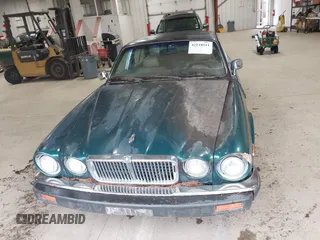 1985 Jaguar XJ with VIN SAJAV1347FC414864, listed as a IAAI auction lot 42118511 with 117,185 mi miles and . Bid and sale history available at DreamBid. Image 12.