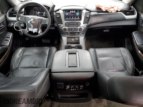2015 Chevrolet Suburban LT with VIN 1GNSCJKC1FR159411, listed as a Copart auction lot 52169465 with 145,511 mi miles and Salvage title. Bid and sale history available at DreamBid. Image 8.
