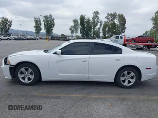 2014 Dodge Charger SE with VIN 2C3CDXBG3EH131242, listed as a IAAI auction lot 42121260 with 231,452 mi miles and . Bid and sale history available at DreamBid. Image 14.