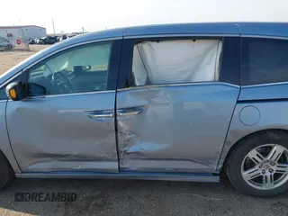 2011 Honda Odyssey Touring with VIN 5FNRL5H9XBB085626, listed as a IAAI auction lot 41890577 with 178,317 mi miles and . Bid and sale history available at DreamBid. Image 14.