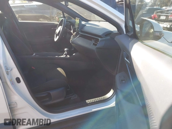 2019 Toyota C-HR XLE with VIN JTNKHMBX4K1058916, listed as a IAAI auction lot 41296963 with 113,290 mi miles. Bid and sale history available at carsss.com. Image 5.