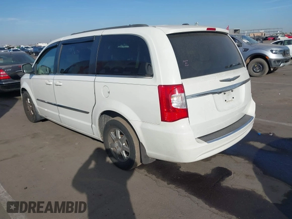 2012 Chrysler Town & Country Touring z VIN 2C4RC1BGXCR410507, wystawiony jako IAAI lot #41215704 z przebiegiem 161 501 mil mil oraz . Historia ofert i sprzedaży dostępna na DreamBid. Obrazek 3.