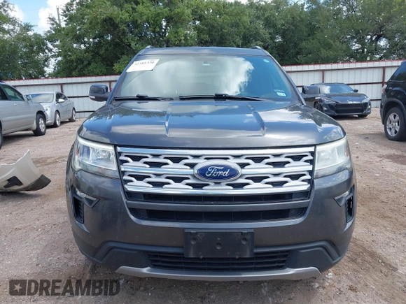 2018 Ford Explorer XLT z VIN 1FM5K7D8XJGC53906, wystawiony jako IAAI lot #42381320 z przebiegiem 142 782 mil mil oraz . Historia ofert i sprzedaży dostępna na DreamBid. Obrazek 12.