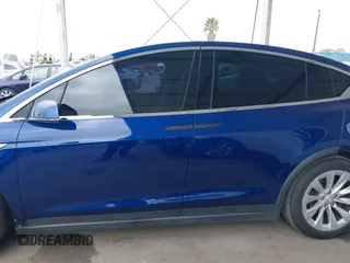2016 Tesla Model X 70D z VIN 5YJXCBE29GF018794, wystawiony jako IAAI lot #42129574 z przebiegiem 51 814 mil mil oraz . Historia ofert i sprzedaży dostępna na DreamBid. Obrazek 14.