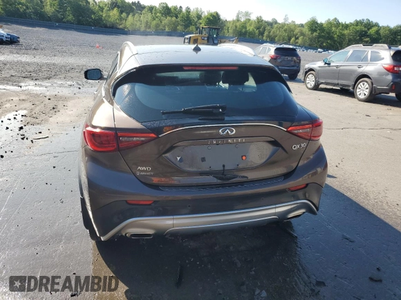 2019 Infiniti QX30 Luxe z VIN SJKCH5CR8KA006894, wystawiony jako Copart lot #58809565 z przebiegiem 50 697 mil mil oraz Szkoda całkowita • Salvage title. Historia ofert i sprzedaży dostępna na DreamBid. Obrazek 6.