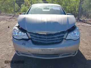 2009 Chrysler Sebring Limited z VIN 1C3LC56V29N561843, wystawiony jako IAAI lot #42286794 z przebiegiem 60 182 mil mil oraz . Historia ofert i sprzedaży dostępna na DreamBid. Obrazek 6.