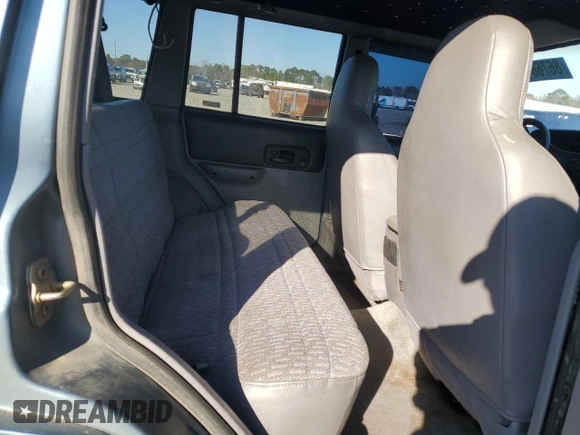 1998 Jeep Cherokee Sport with VIN 1J4FT68S0WL138603, listed as a Copart auction lot 86766454 with 0 mi miles and Salvage Title. Bid and sale history available at carsss.com. Image 11.