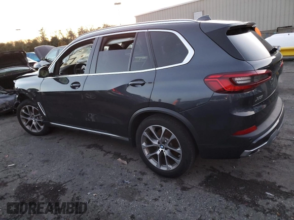 2021 BMW X5 sDrive40i with VIN 5UXCR4C03M9E13698, listed as a Copart auction lot 84158714 with 0 mi miles and Salvage Title. Bid and sale history available at carsss.com. Image 2.