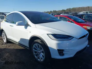 2016 Tesla Model X P90D with VIN 5YJXCBE47GF020576, listed as a IAAI auction lot 41452067 with 155,238 mi miles. Bid and sale history available at carsss.com. Image 1.