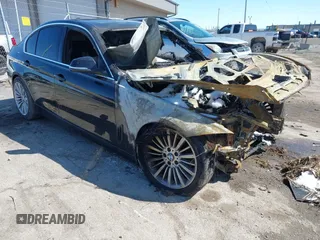 2013 BMW 3 Series 328i xDrive with VIN WBA3B5C54DF595768, listed as a IAAI auction lot 41856610 with 1 mi miles. Bid and sale history available at carsss.com. Image 1.