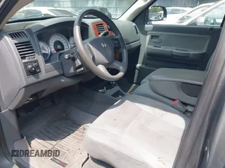 2005 Dodge Dakota SLT with VIN 1D7HW42N25S155393, listed as a IAAI auction lot 42727690 with 230,042 mi miles and . Bid and sale history available at DreamBid. Image 8.