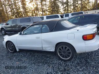 1993 Toyota Celica z VIN JT5ST87K6P0145748, wystawiony jako IAAI lot #41401540 z przebiegiem 165 469 mil mil oraz . Historia ofert i sprzedaży dostępna na DreamBid. Obrazek 14.
