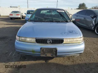 1996 Mercury Mystique z VIN 1MELM6532TK639432, wystawiony jako Copart lot #41884055 z przebiegiem 134 991 mil mil oraz Tytuł czysty. Historia ofert i sprzedaży dostępna na DreamBid. Obrazek 5.