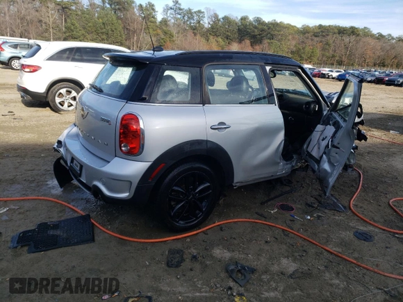 2016 MINI Countryman S with VIN WMWZC5C55GWU22112, listed as a Copart auction lot 82132654 with 60,210 mi miles and Salvage Title. Bid and sale history available at DreamBid. Image 3.
