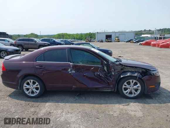 2012 Ford Fusion SE z VIN 3FAHP0HA6CR426765, wystawiony jako IAAI lot #42388306 z przebiegiem 120 016 mil mil oraz . Historia ofert i sprzedaży dostępna na DreamBid. Obrazek 6.