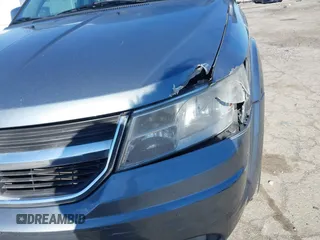 2010 Dodge Journey SXT with VIN 3D4PH5FVXAT107023, listed as a IAAI auction lot 41747572 with 165,568 mi miles and . Bid and sale history available at DreamBid. Image 6.