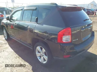 2013 Jeep Compass Sport with VIN 1C4NJDBB4DD113831, listed as a IAAI auction lot 42059122 with 135,062 mi miles. Bid and sale history available at carsss.com. Image 3.