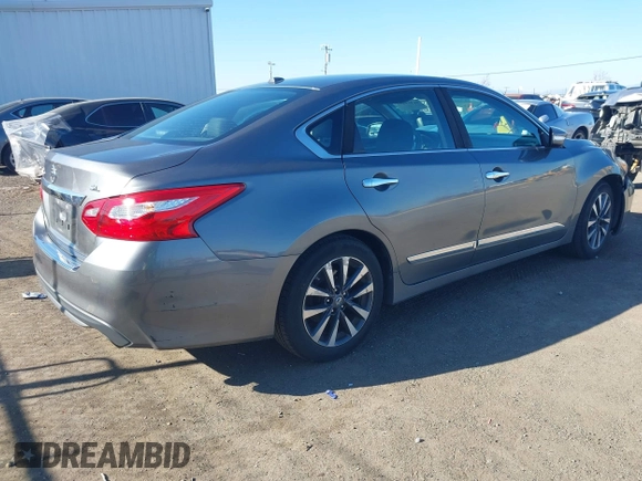 2016 Nissan Altima SV with VIN 1N4AL3AP7GC147035, listed as a IAAI auction lot 41419451 with 104,810 mi miles and . Bid and sale history available at DreamBid. Image 4.