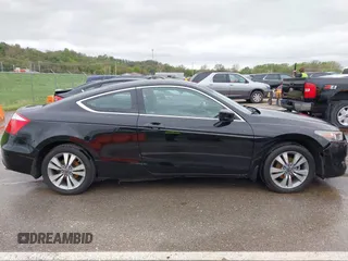 2009 Honda Accord LX-S with VIN 1HGCS12339A010440, listed as a IAAI auction lot 42045025 with 126,767 mi miles and . Bid and sale history available at DreamBid. Image 13.