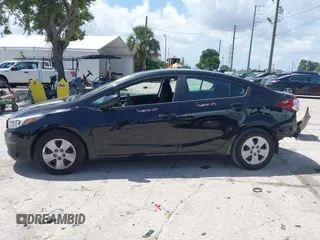 2018 Kia Forte LX z VIN 3KPFK4A70JE197056, wystawiony jako IAAI lot #42435555 z przebiegiem 79 805 mil mil oraz . Historia ofert i sprzedaży dostępna na DreamBid. Obrazek 15.