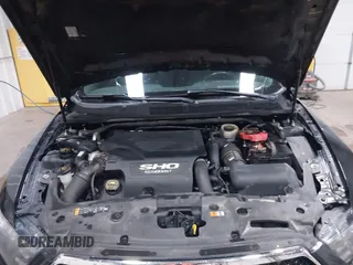 2015 Ford Taurus SHO with VIN 1FAHP2KT6FG137418, listed as a IAAI auction lot 42256452 with 140,335 mi miles and . Bid and sale history available at DreamBid. Image 10.
