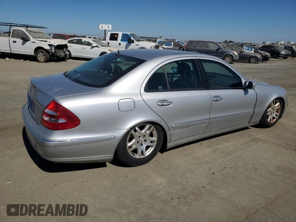 2003 Mercedes-Benz E-Class 3.2L with VIN WDBUF65JX3A096821, listed as a Copart auction lot 74378684 with 157,088 mi miles and Clean Title. Bid and sale history available at carsss.com. Image 3.