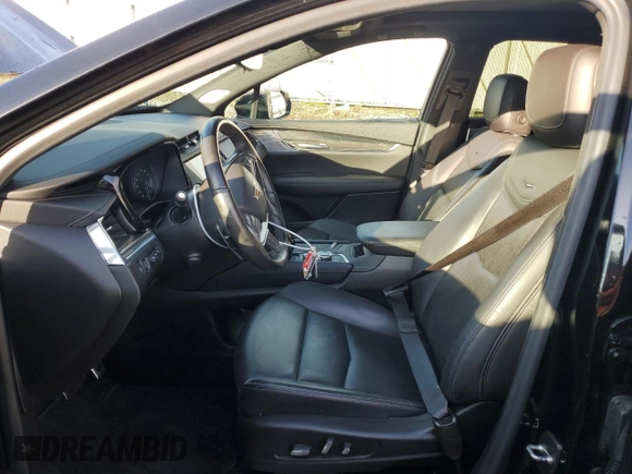 2023 Cadillac XT5 AWD Sport with VIN 1GYKNGRS6PZ131182, listed as a Copart auction lot 49907105 with 38,734 mi miles and Salvage title. Bid and sale history available at DreamBid. Image 7.