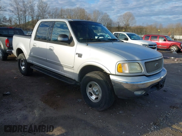 2002 Ford F-150 XLT with VIN 1FTRW08632KE22611, listed as a IAAI auction lot 41519768 with 200,420 mi miles. Bid and sale history available at carsss.com. Image 1.