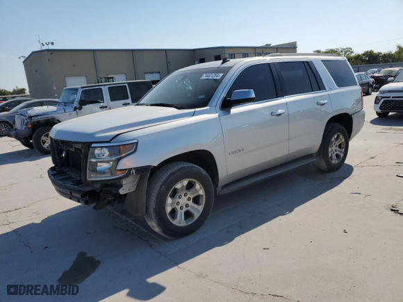 2015 Chevrolet Tahoe LS with VIN 1GNSKAKC3FR245127, listed as a Copart auction lot 74401204 with 160,179 mi miles and Salvage Title. Bid and sale history available at carsss.com. Image 1.