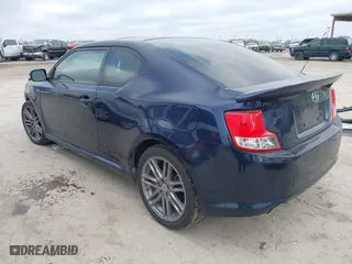 2012 Scion tC with VIN JTKJF5C77C3032626, listed as a IAAI auction lot 41774978 with 177,962 mi miles. Bid and sale history available at carsss.com. Image 3.