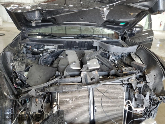 2016 Infiniti QX70 with VIN JN8CS1MW0GM753031, listed as a Copart auction lot 59922585 with 110,236 mi miles and Salvage title. Bid and sale history available at DreamBid. Image 12.
