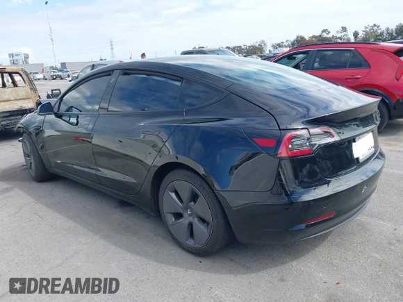 2022 Tesla Model 3 with VIN 5YJ3E1EA7NF314744, listed as a IAAI auction lot 42057596 with 30,936 mi miles and . Bid and sale history available at DreamBid. Image 14.