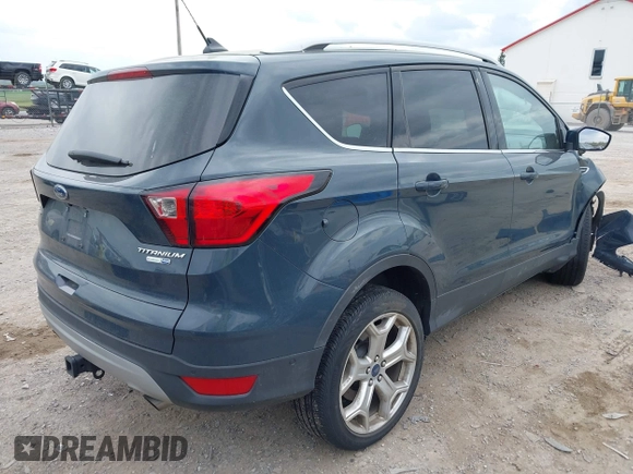 2019 Ford Escape Titanium with VIN 1FMCU9J95KUC19062, listed as a IAAI auction lot 42112188 with 26,100 mi miles. Bid and sale history available at carsss.com. Image 4.