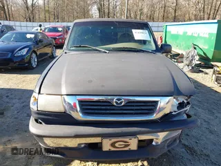 1998 Mazda B-Series 2WD Truck SX with VIN 4F4YR12C4WTM47743, listed as a IAAI auction lot 41430832 with 318,909 mi miles. Bid and sale history available at carsss.com. Image 13.