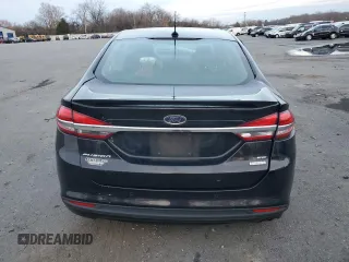 2017 Ford Fusion SE z VIN 3FA6P0HD1HR312200, wystawiony jako Copart lot #82823184 z przebiegiem Nie podano mil oraz Szkoda całkowita • Salvage title. Historia ofert i sprzedaży dostępna na DreamBid. Obrazek 6.