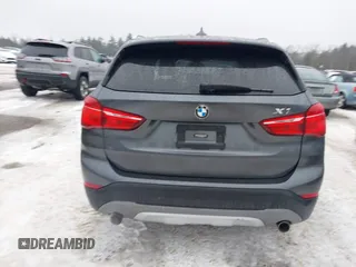 2016 BMW X1 xDrive28i with VIN WBXHT3C34GP880738, listed as a IAAI auction lot 41398105 with 113,445 mi miles and . Bid and sale history available at DreamBid. Image 17.