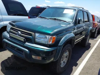 2000 Toyota 4Runner SR5 z VIN JT3GN86R0Y0167558, wystawiony jako IAAI lot #42361644 z przebiegiem 302 702 mil mil oraz . Historia ofert i sprzedaży dostępna na DreamBid. Obrazek 2.