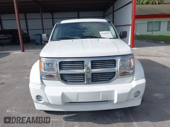 2007 Dodge Nitro SXT z VIN 1D8GT28K17W530705, wystawiony jako IAAI lot #42456213 z przebiegiem 217 175 mil mil oraz . Historia ofert i sprzedaży dostępna na DreamBid. Obrazek 6.