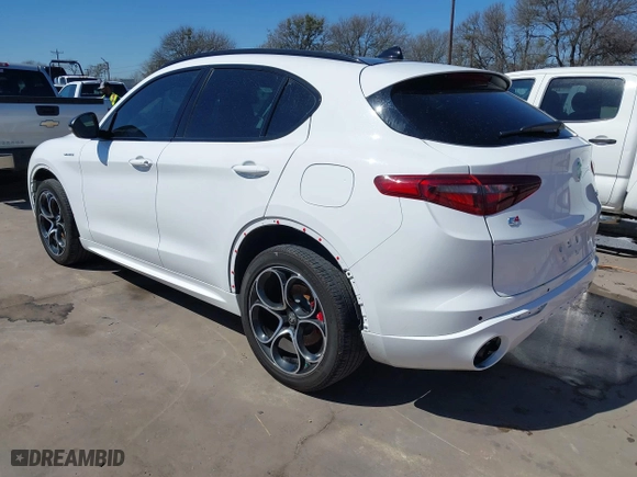 2023 Alfa Romeo Stelvio Ti with VIN ZASPAKBN4P7D63524, listed as a IAAI auction lot 41626631 with 37,731 mi miles. Bid and sale history available at carsss.com. Image 3.