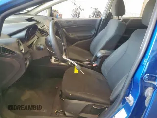 2019 Ford Fiesta SE z VIN 3FADP4EJ4KM142797, wystawiony jako Copart lot #56876095 z przebiegiem 82 545 mil mil oraz Szkoda całkowita • Salvage title. Historia ofert i sprzedaży dostępna na DreamBid. Obrazek 7.