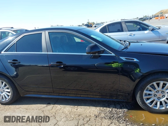2013 Cadillac CTS Luxury with VIN 1G6DE5E51D0165634, listed as a IAAI auction lot 42208023 with 92,827 mi miles and . Bid and sale history available at DreamBid. Image 13.