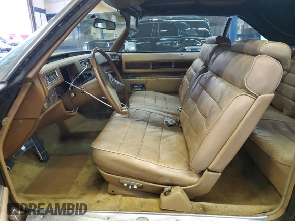 1976 Cadillac Eldorado z VIN 6L67S6Q235270, wystawiony jako Copart lot #80518554 z przebiegiem 4 944 mil mil oraz Szkoda całkowita • Salvage title. Historia ofert i sprzedaży dostępna na DreamBid. Obrazek 7.