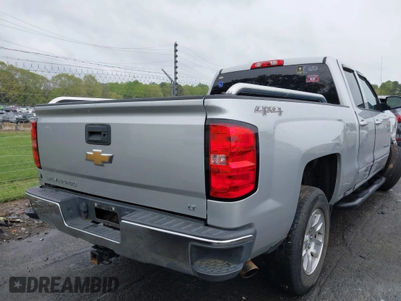 2018 Chevrolet Silverado 1500 LT with VIN 1GCVKREC7JZ151678, listed as a IAAI auction lot 41972011 with 106,892 mi miles and . Bid and sale history available at DreamBid. Image 16.
